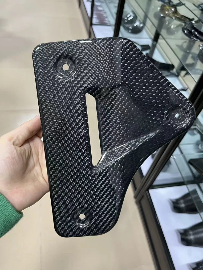 Real custom carbon fiber molded component with glossy woven finish