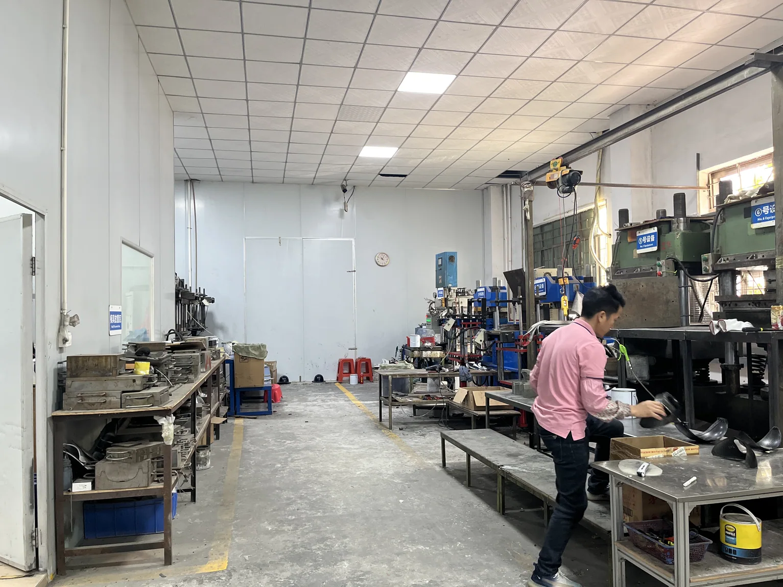 Actual carbon fiber composite factory workshop with manufacturing equipment