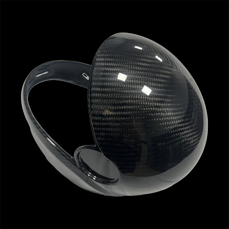 Custom carbon fiber open-face helmet shell sample