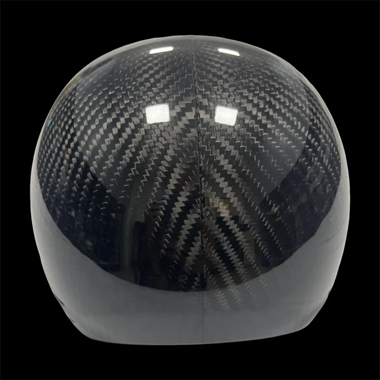 Compact shell with woven surface; actual carbon fiber helmet shell project reference