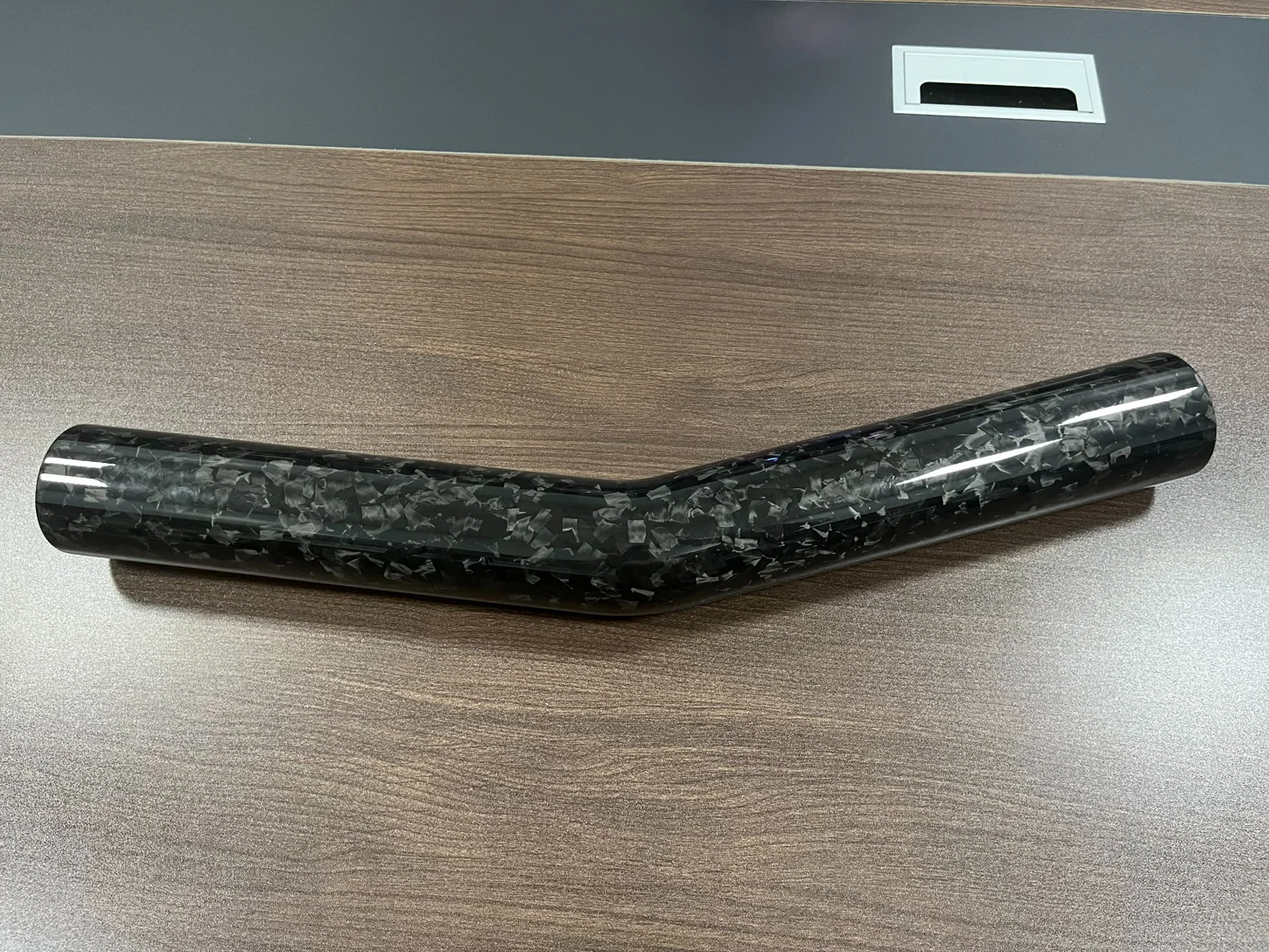 Custom formed carbon fiber tube